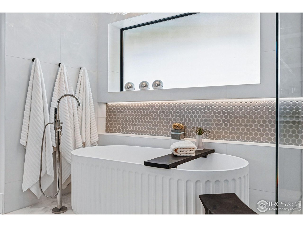 6923 Hunter Place Boulder, CO 80301 - Photo 19 of 34 a bathroom with a sink and a mirror