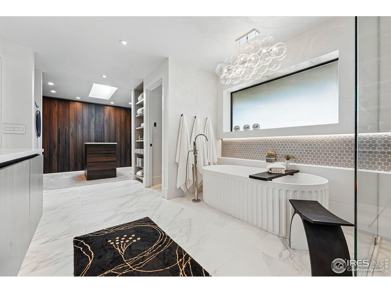 6923 Hunter Place Boulder, CO 80301 - Photo 21 of 34 a kitchen with stainless steel appliances kitchen island a sink refrigerator and cabinets