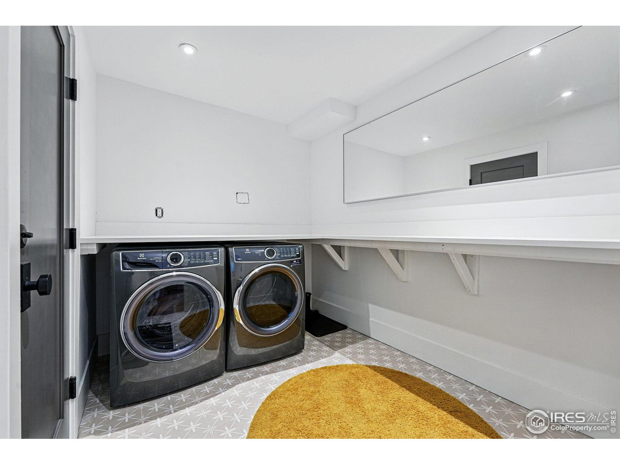6923 Hunter Place Boulder, CO 80301 - Photo 29 of 34 a utility room with sink dryer and washer