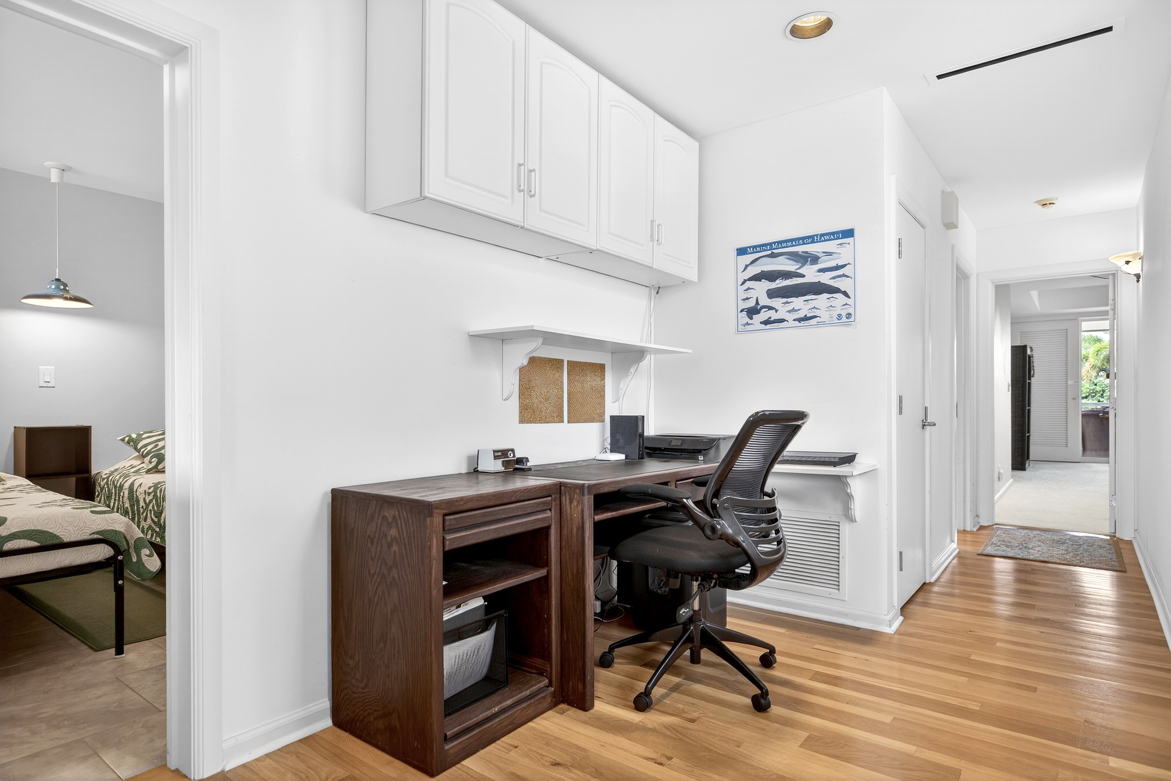 68-1375 Pauoa Road, Unit Q2 Kamuela, HI 96743 - Photo 12 of 30 a view of a workspace with furniture and wooden floor