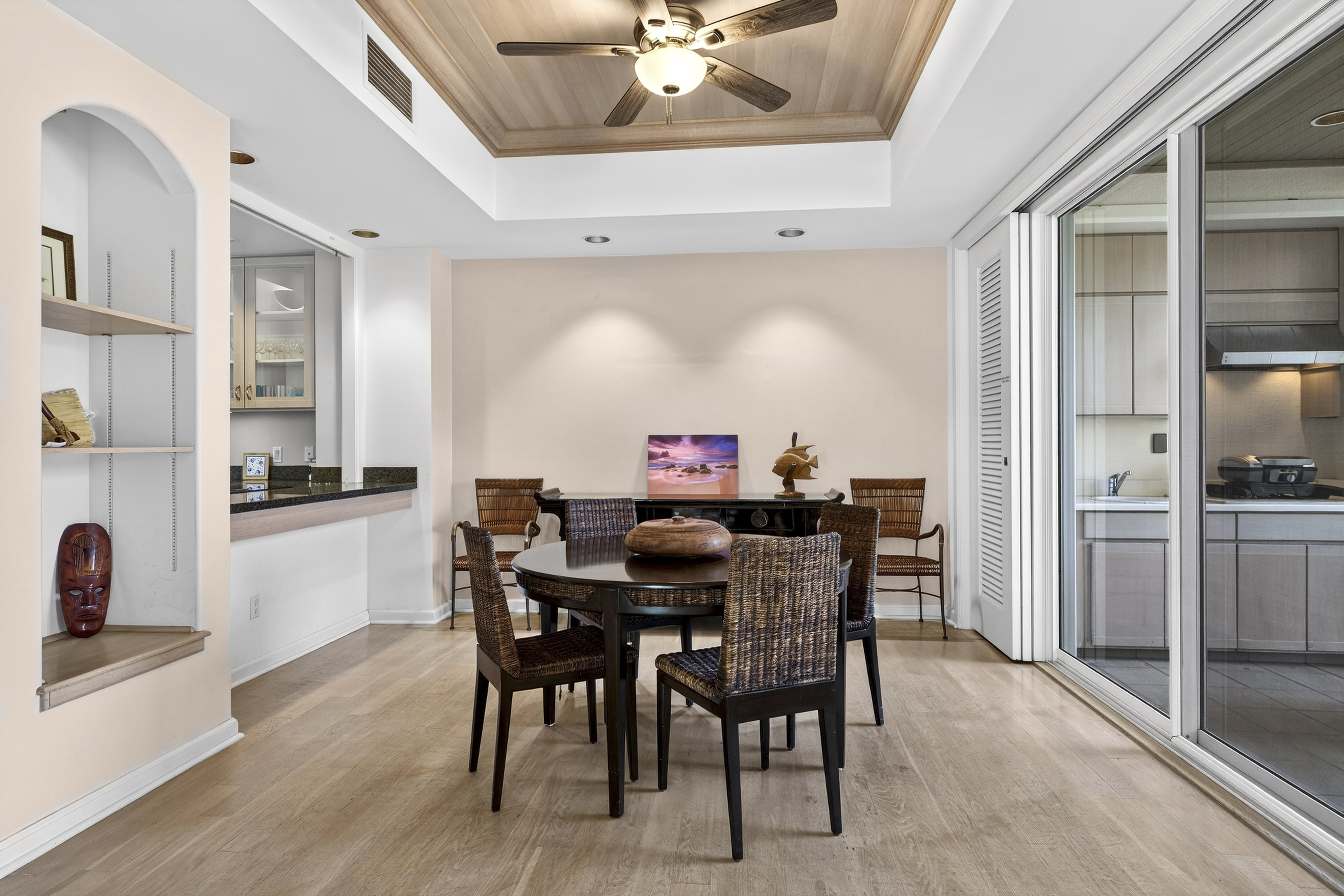 68-1375 Pauoa Road, Unit Q2 Kamuela, HI 96743 - Photo 5 of 30 a view of a dining room with furniture and wooden floor