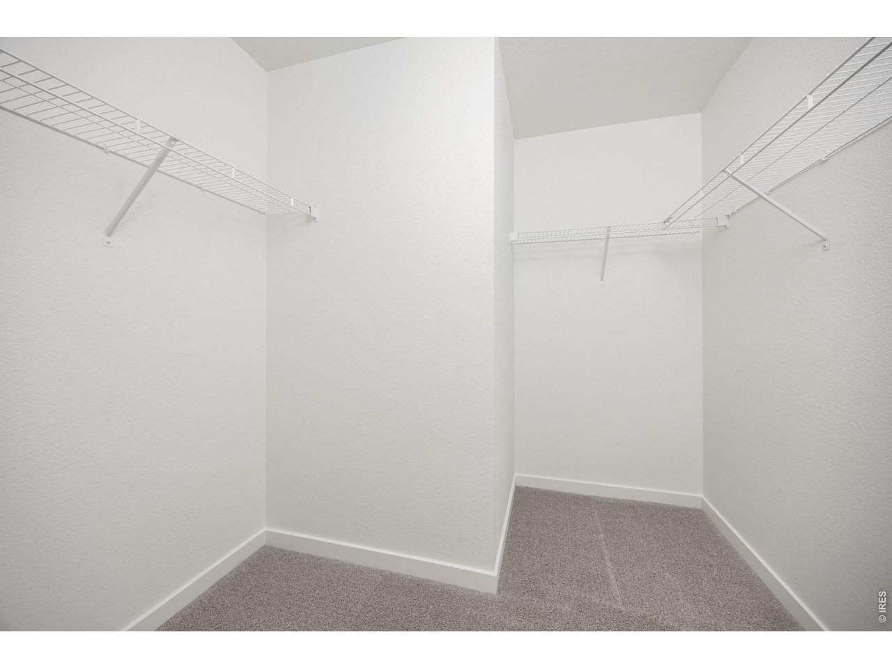 315 Condor Way Johnstown, CO 80534 - Photo 17 of 25 a view of an empty walk in closet