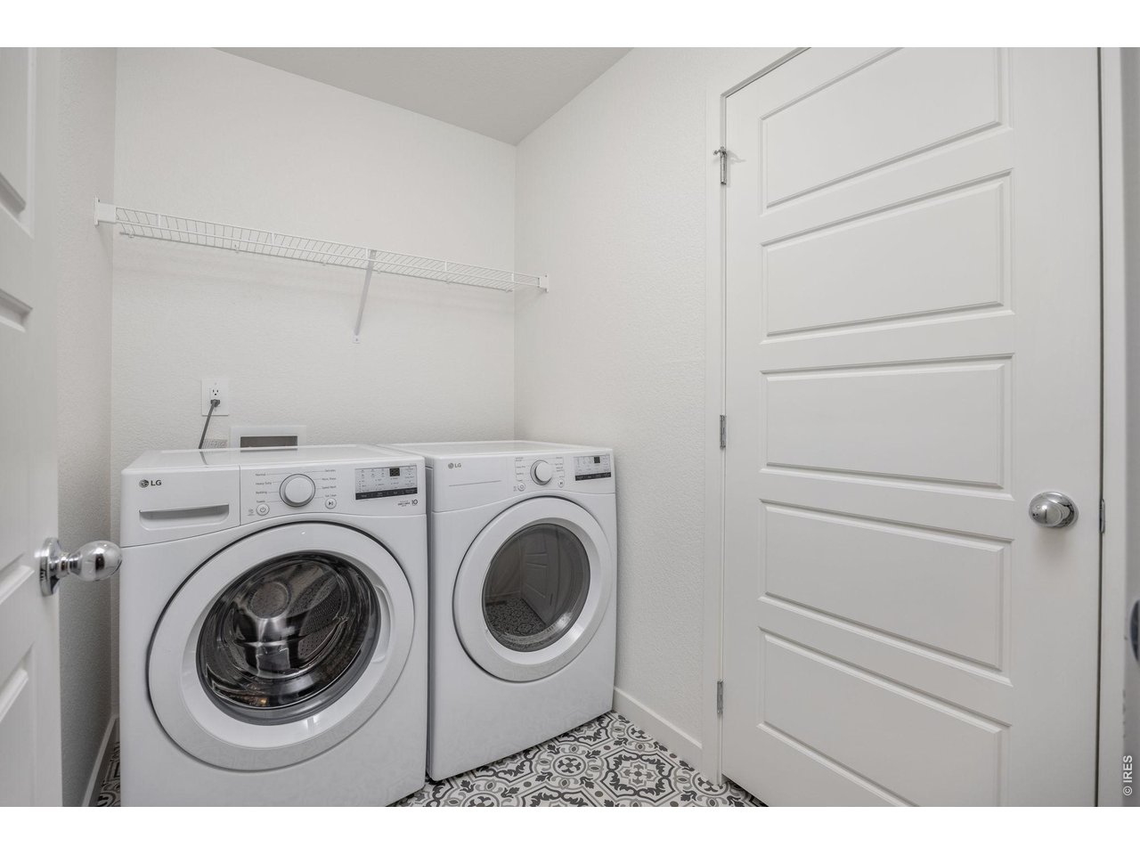 315 Condor Way Johnstown, CO 80534 - Photo 19 of 25 a utility room with dryer and washer