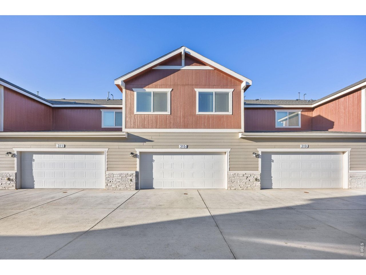 315 Condor Way Johnstown, CO 80534 - Photo 25 of 25 a front view of a house with a yard