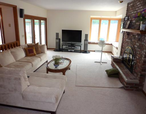 10384 Grubbs Road Wexford, PA 15090 - Photo 8 of 18 Den/Family/Great Room. The large family room features a fireplace, wet bar and access to the pool, sunroom and kitchen.