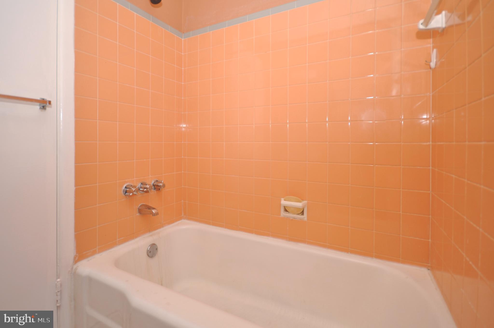 8035 Pine Road Philadelphia, PA 19111 - Photo 13 of 23 a bathroom with a bathtub