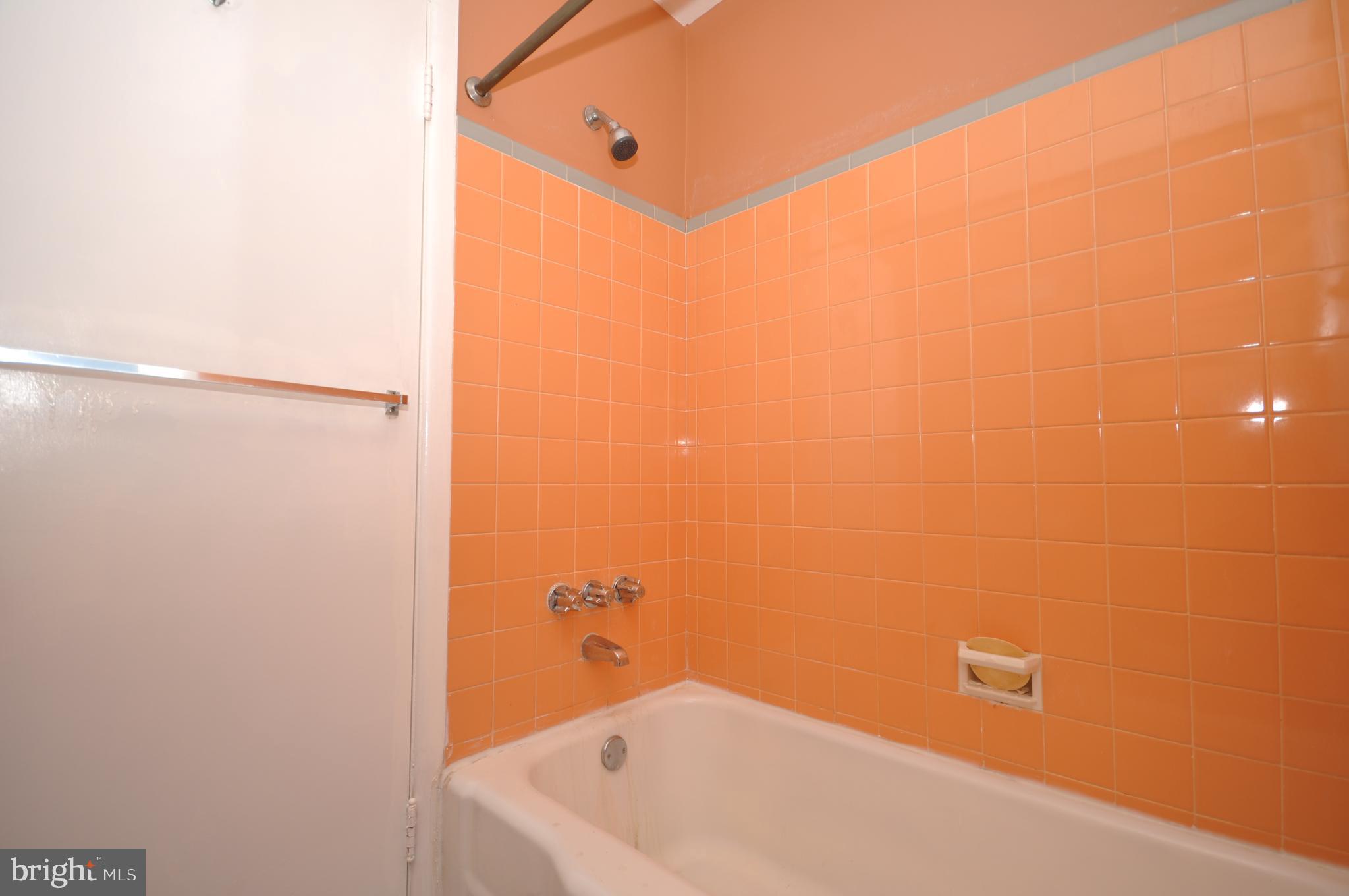 8035 Pine Road Philadelphia, PA 19111 - Photo 14 of 23 a bathroom with a bathtub