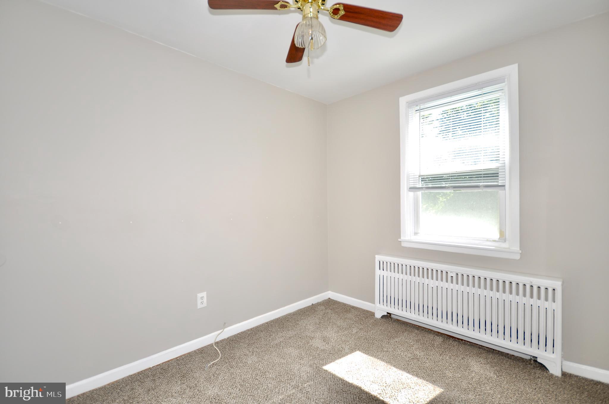 8035 Pine Road Philadelphia, PA 19111 - Photo 17 of 23 a view of an empty room with a window