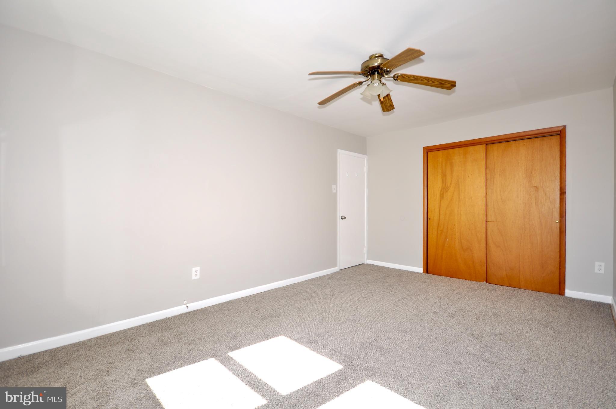 8035 Pine Road Philadelphia, PA 19111 - Photo 18 of 23 a view of a room with a window and a ceiling fan