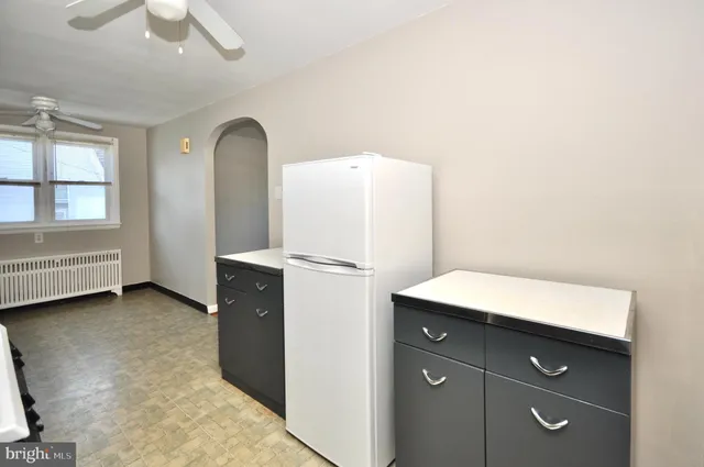 a room with a furniture and a window