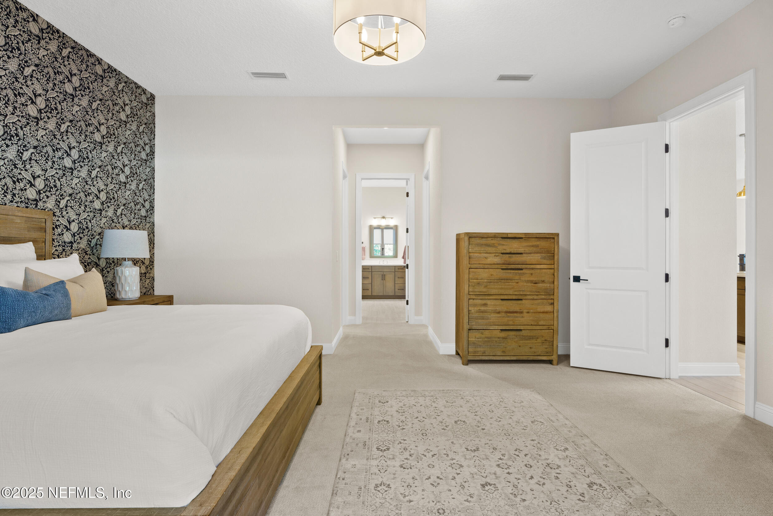 160 Hickory Ranch Drive St. Johns, FL 32259 - Photo 17 of 42 a bedroom with a bed and a cabinets