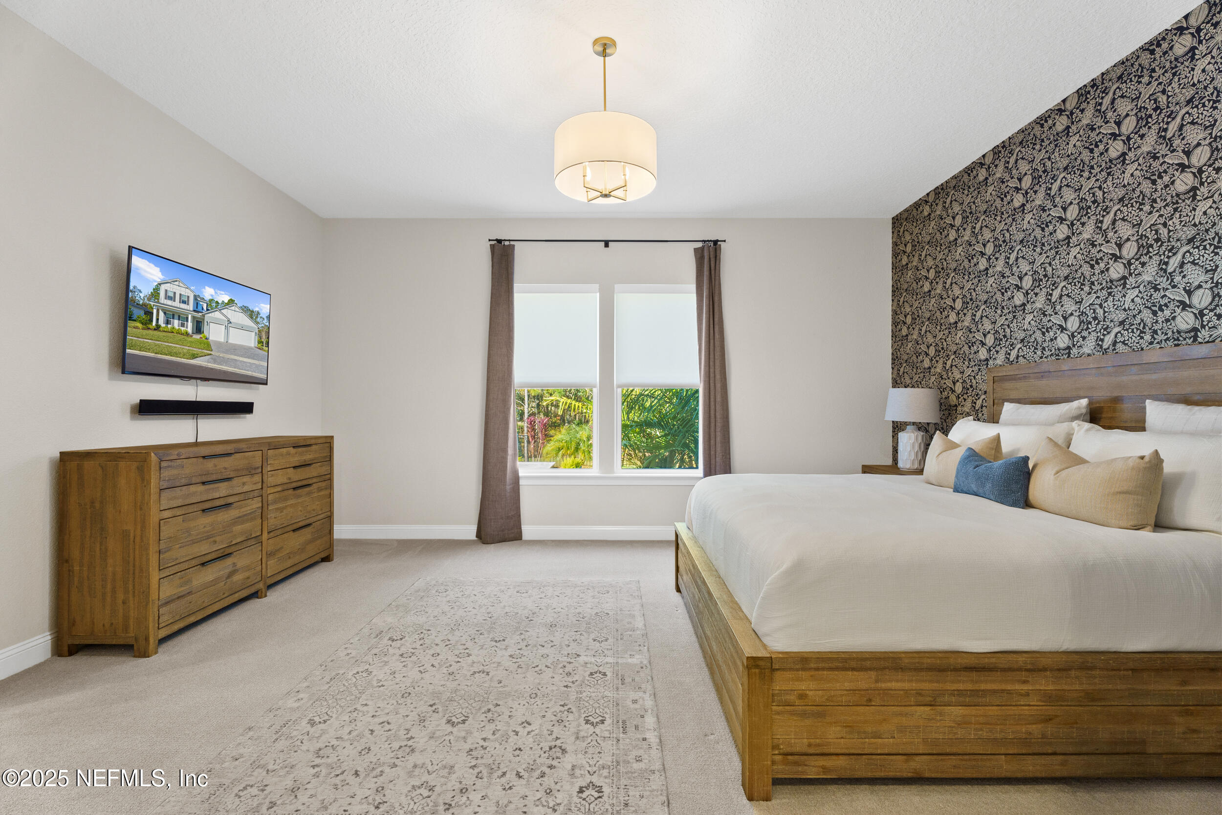 160 Hickory Ranch Drive St. Johns, FL 32259 - Photo 19 of 42 a bed room with a bed and a window