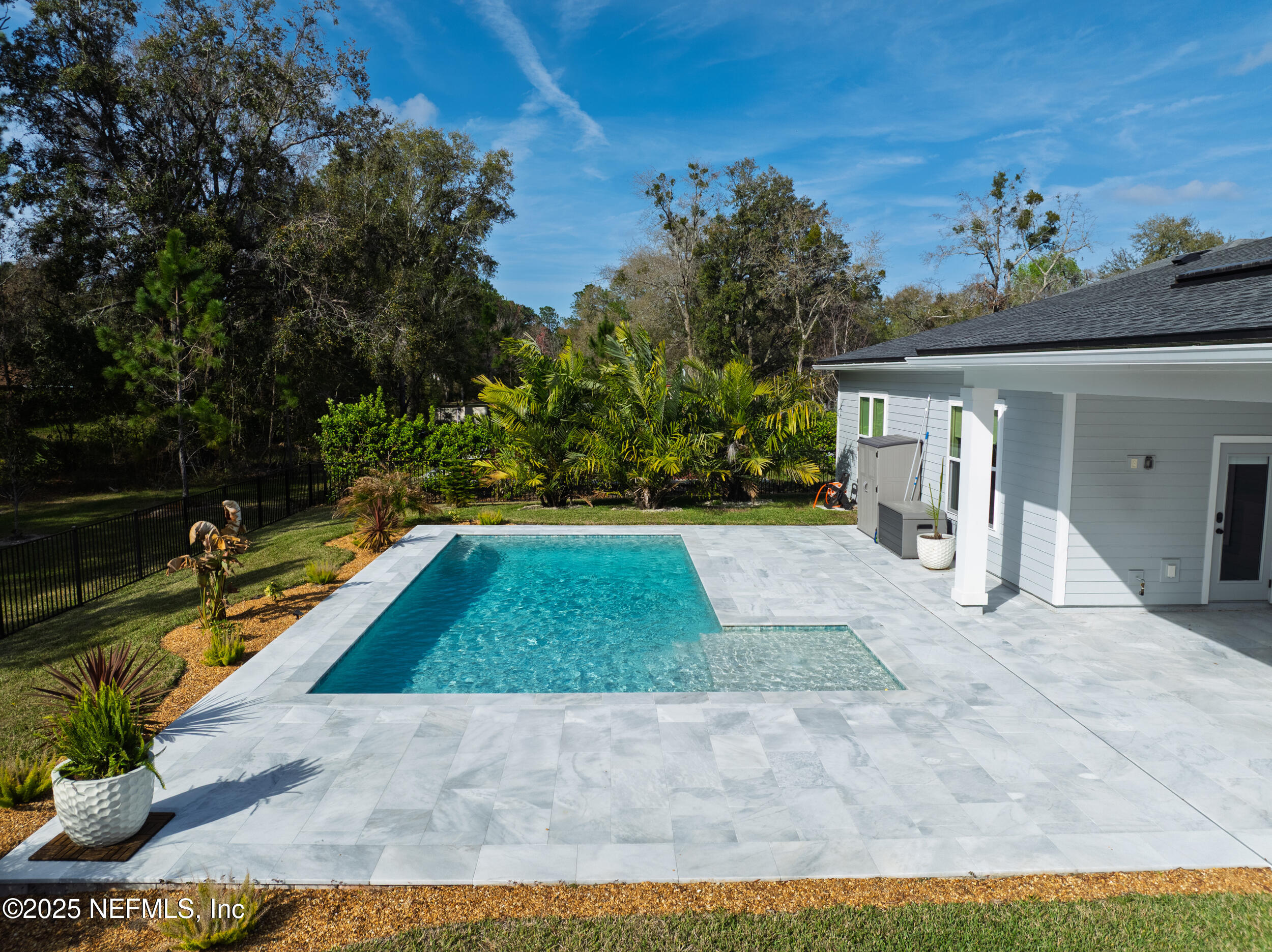 160 Hickory Ranch Drive St. Johns, FL 32259 - Photo 22 of 42 a view of a backyard with plants and lake view
