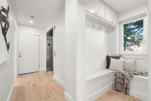 a room with a bed and a window