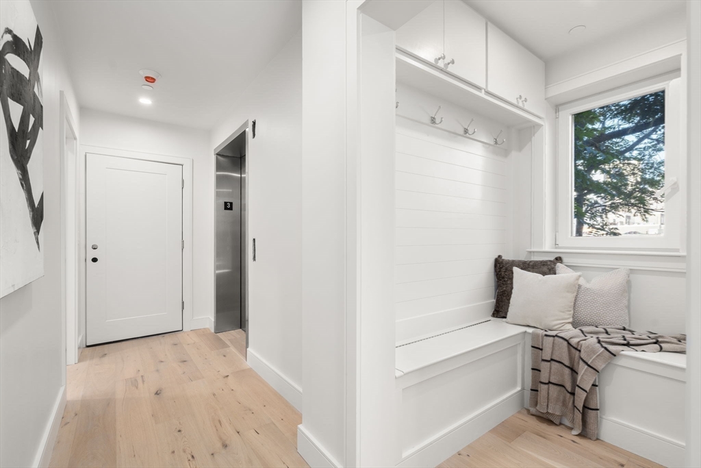 90 A Street, Unit 3 Boston, MA 02127 - Photo 13 of 20 a room with a bed and a window