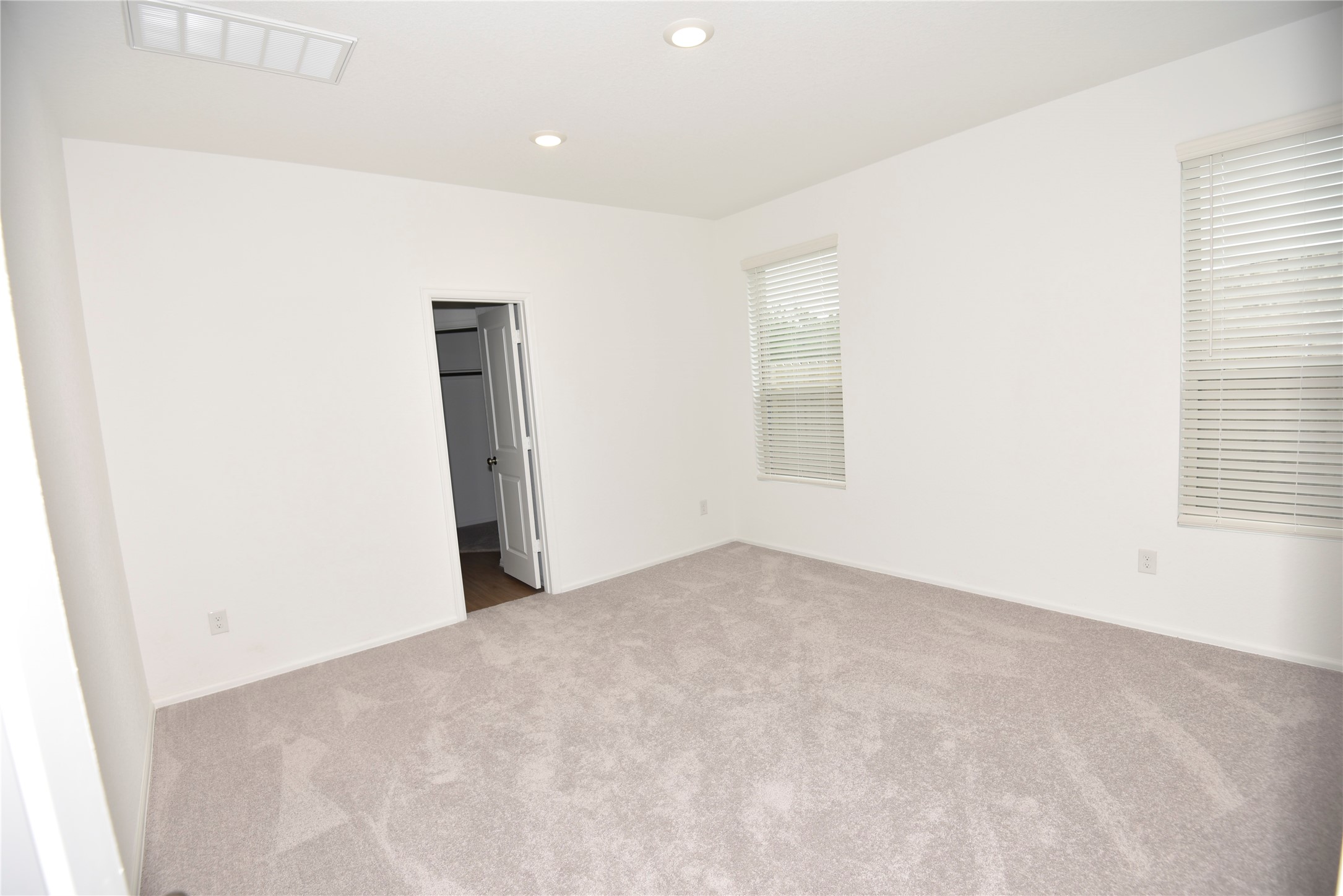 21562 Casavatore Drive New Caney, TX 77357 - Photo 21 of 24 an empty room with a window