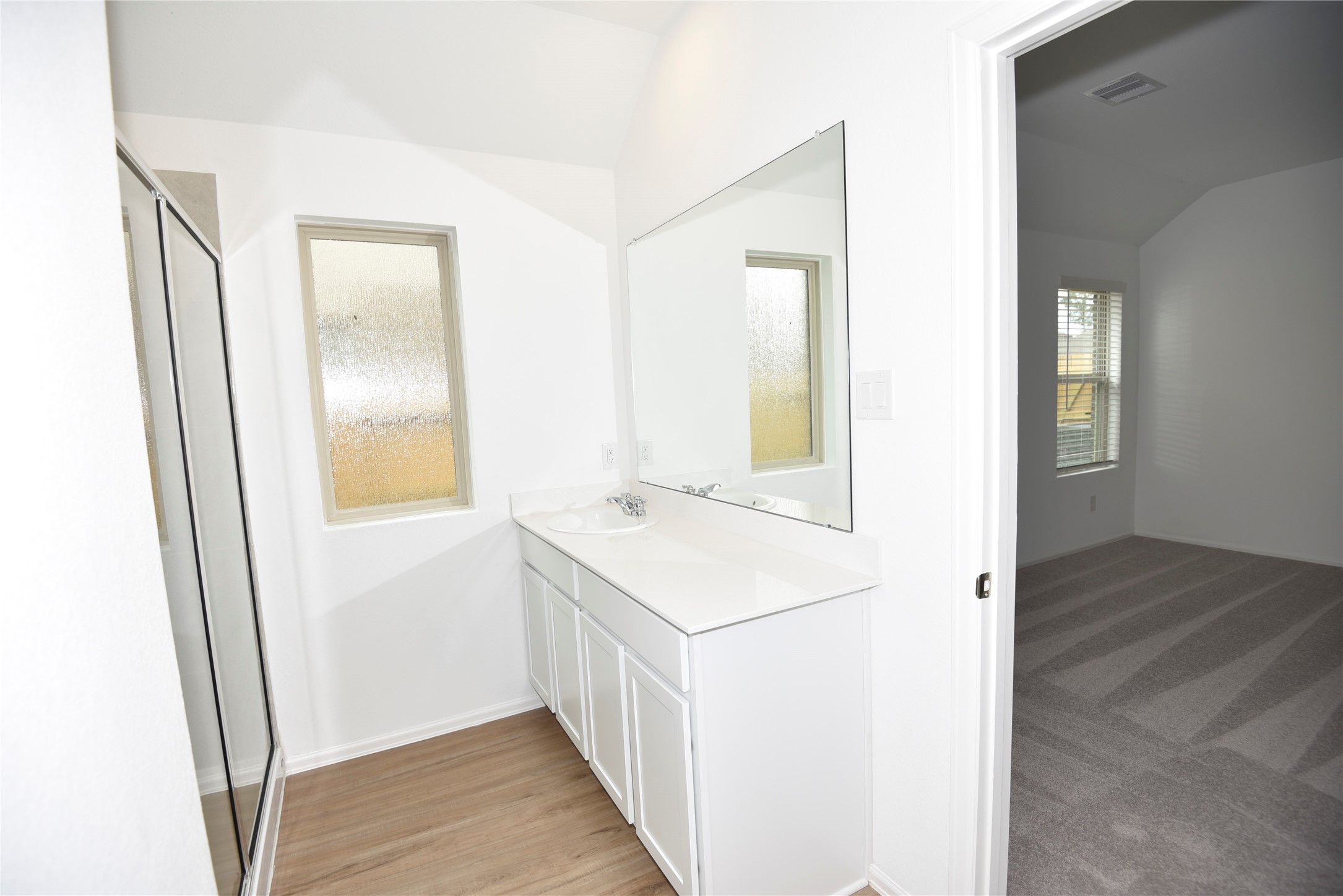 21562 Casavatore Drive New Caney, TX 77357 - Photo 9 of 24 a view of hallway with wooden floor
