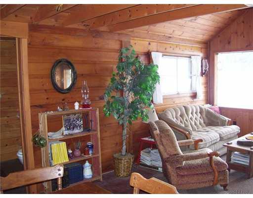 50 7 Islands Road Mapleton, ME 04757 - Photo 12 of 15 Living Room.