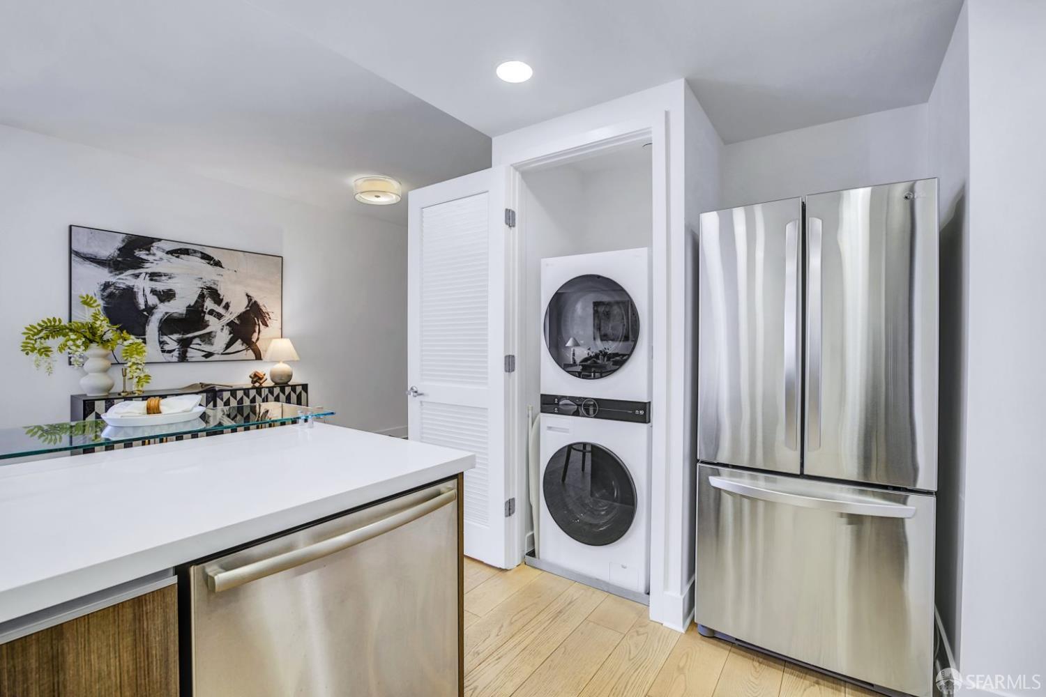 1080 Sutter Street, Unit 702 San Francisco, CA 94109 - Photo 11 of 27 a utility room with dryer and washer