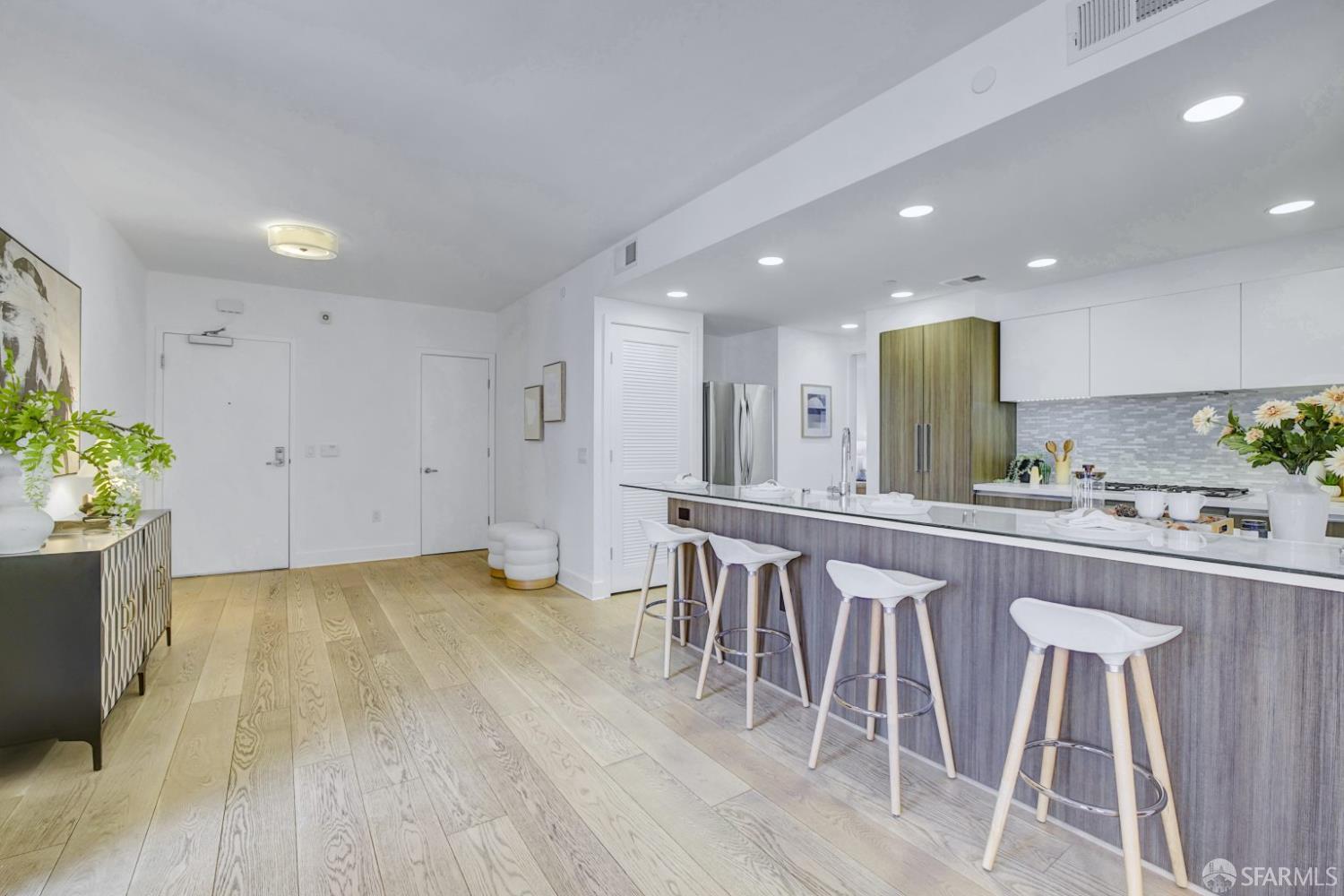 1080 Sutter Street, Unit 702 San Francisco, CA 94109 - Photo 12 of 27 a view of kitchen with wooden floor