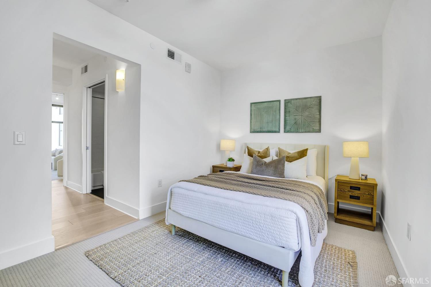 1080 Sutter Street, Unit 702 San Francisco, CA 94109 - Photo 20 of 27 a bedroom with bed and a night stand