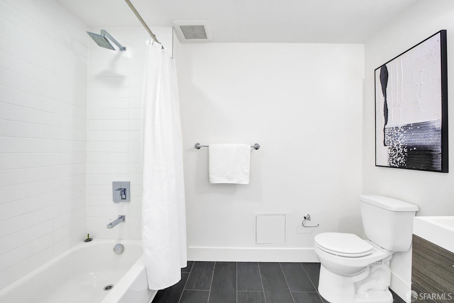 1080 Sutter Street, Unit 702 San Francisco, CA 94109 - Photo 21 of 27 a bathroom with a toilet and a shower