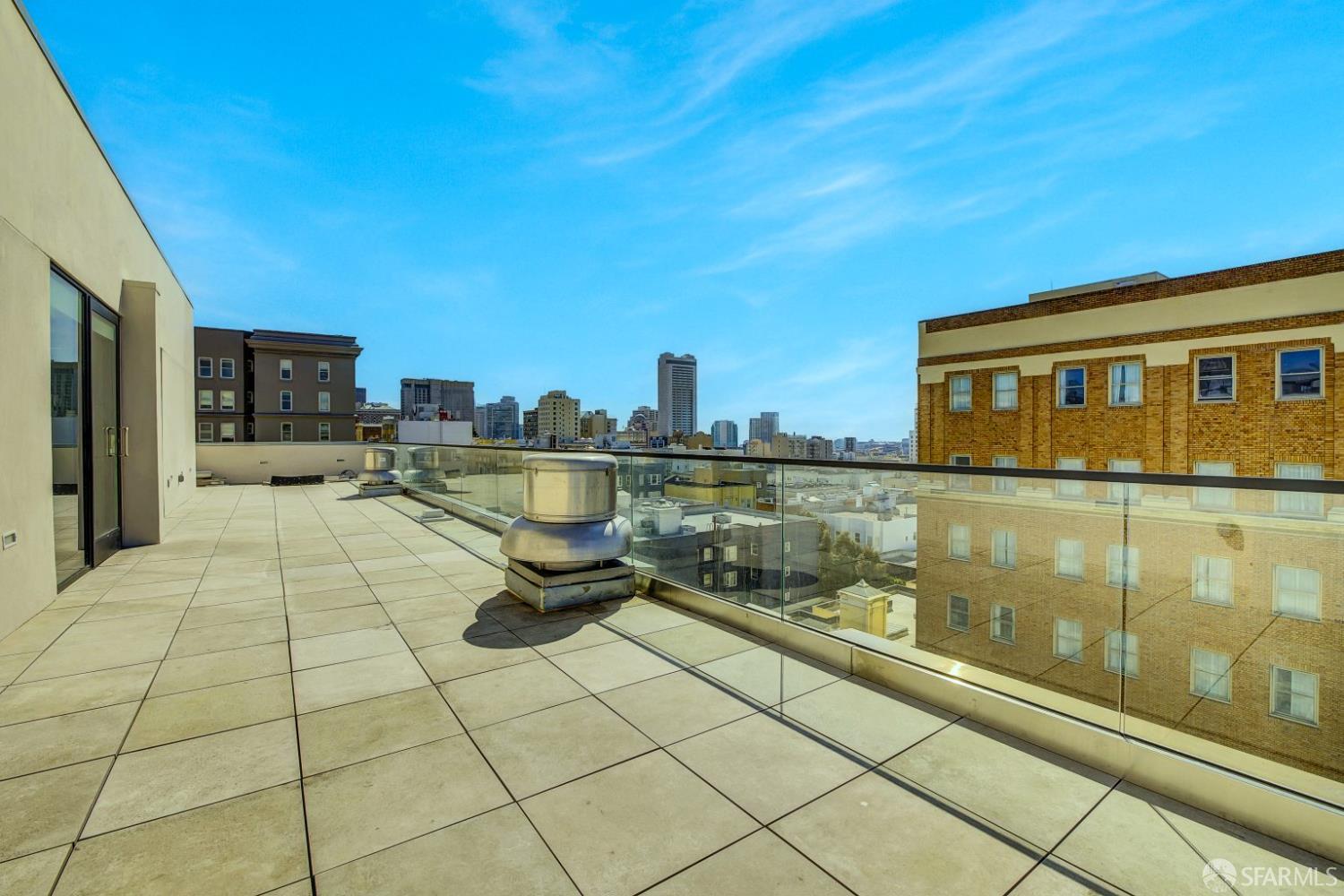 1080 Sutter Street, Unit 702 San Francisco, CA 94109 - Photo 23 of 27 a view of a terrace with chairs