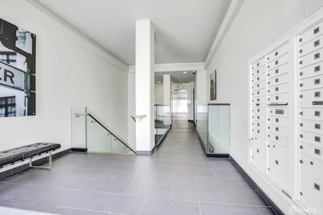 a view of a hallway with staircase