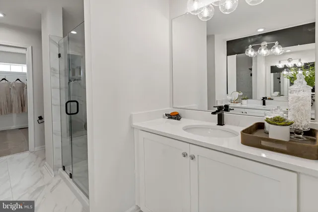 a view of a room with white walls