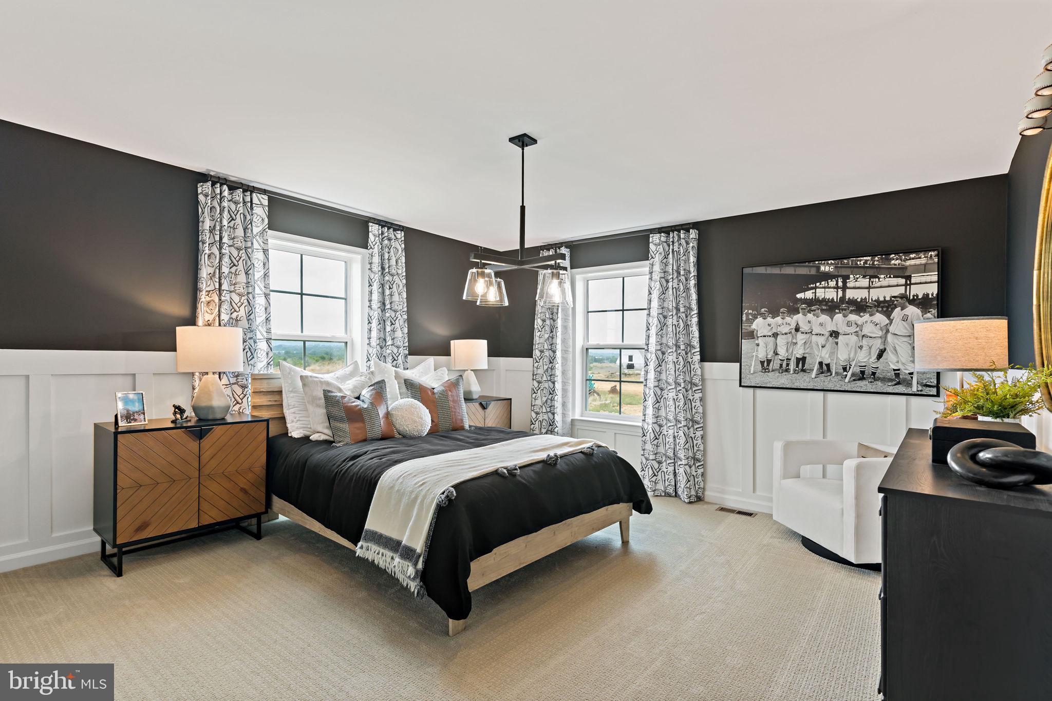 Tbb Tbb Outrigger Road, Unit CARNEGIE Inwood, WV 25428 - Photo 29 of 60 a bedroom with a bed couch and window