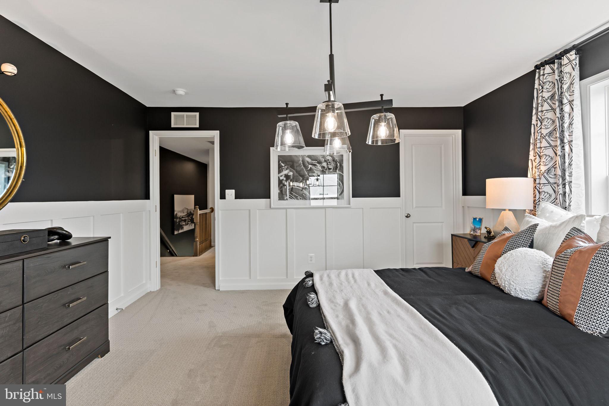 Tbb Tbb Outrigger Road, Unit CARNEGIE Inwood, WV 25428 - Photo 31 of 60 a bedroom with a bed and window