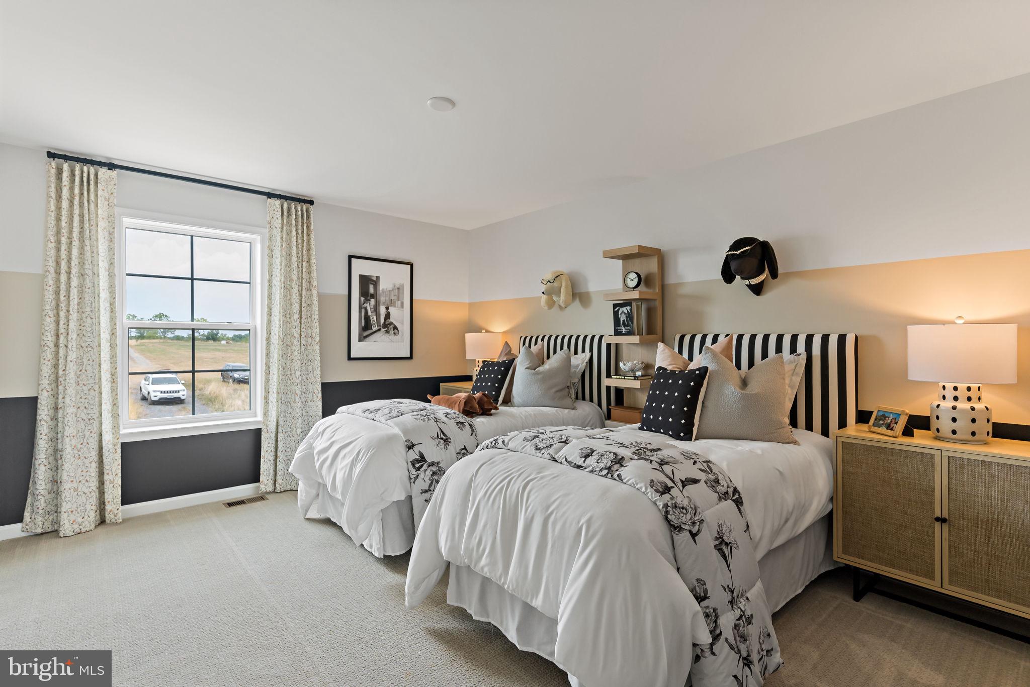 Tbb Tbb Outrigger Road, Unit CARNEGIE Inwood, WV 25428 - Photo 32 of 60 a spacious bedroom with two beds and a window