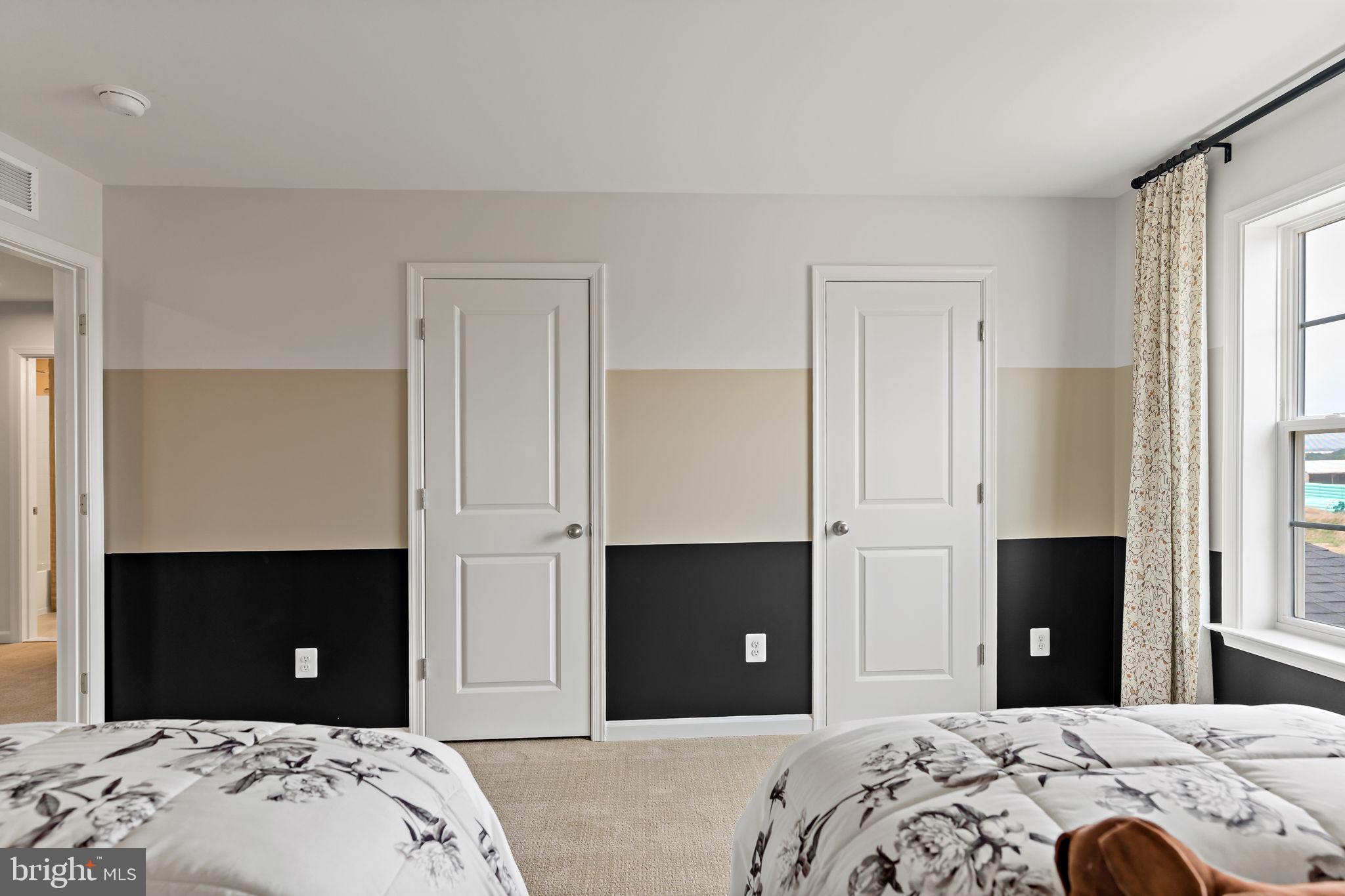 Tbb Tbb Outrigger Road, Unit CARNEGIE Inwood, WV 25428 - Photo 35 of 60 a bedroom with a bed and a closet