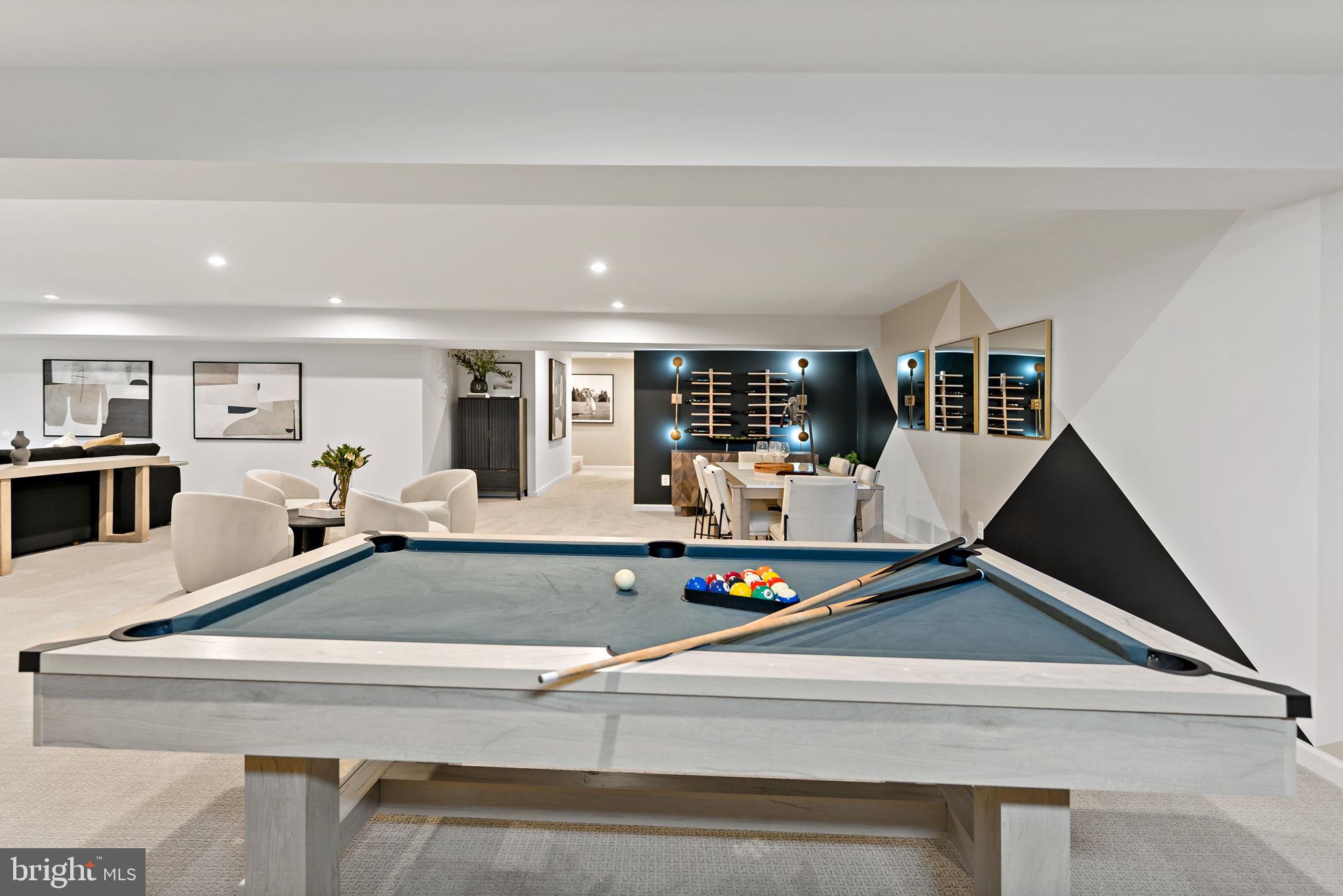 Tbb Tbb Outrigger Road, Unit CARNEGIE Inwood, WV 25428 - Photo 41 of 60 a view of kitchen with kitchen island and stainless steel appliances
