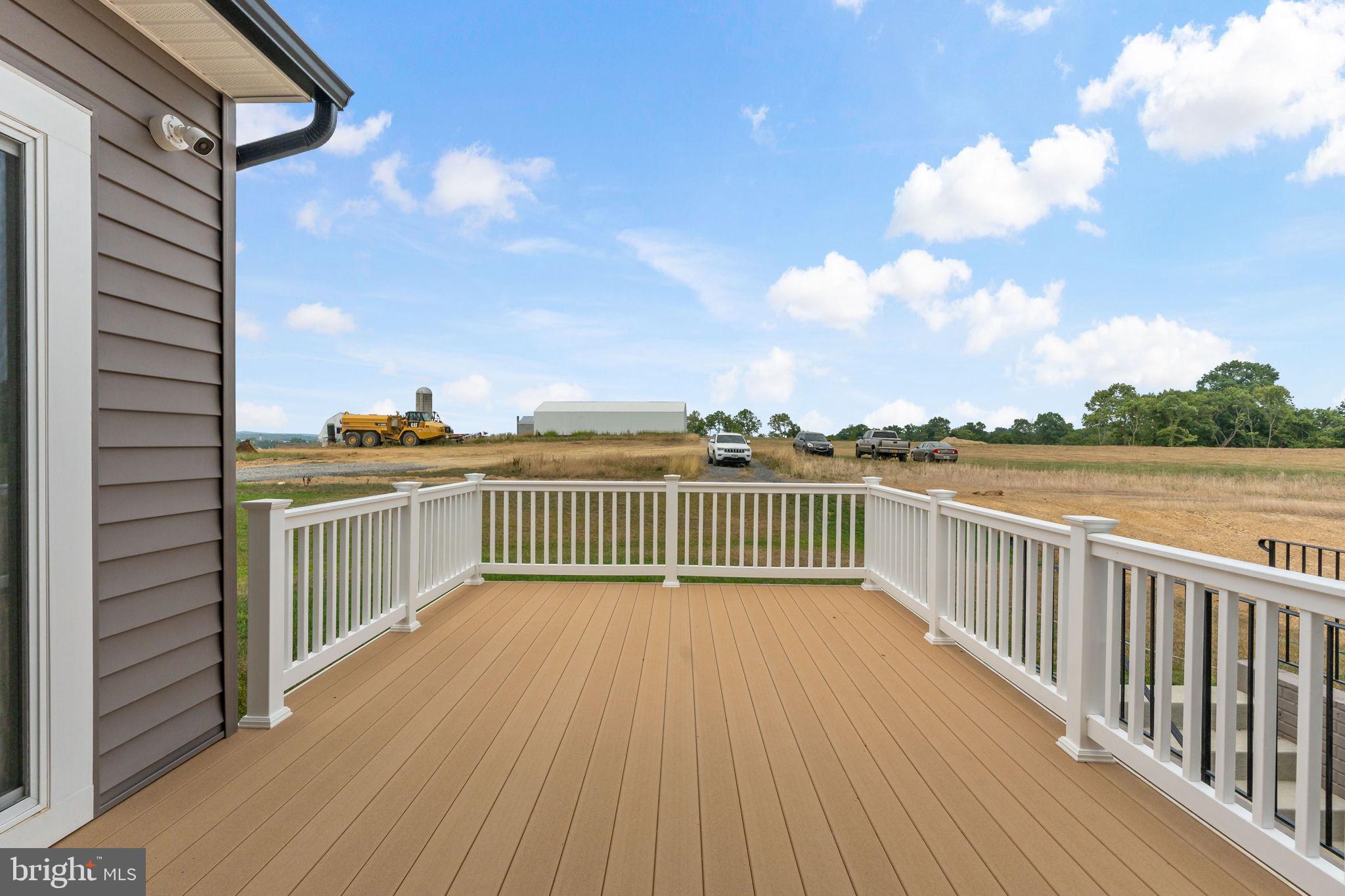 Tbb Tbb Outrigger Road, Unit CARNEGIE Inwood, WV 25428 - Photo 44 of 60 a view of a balcony with wooden floor