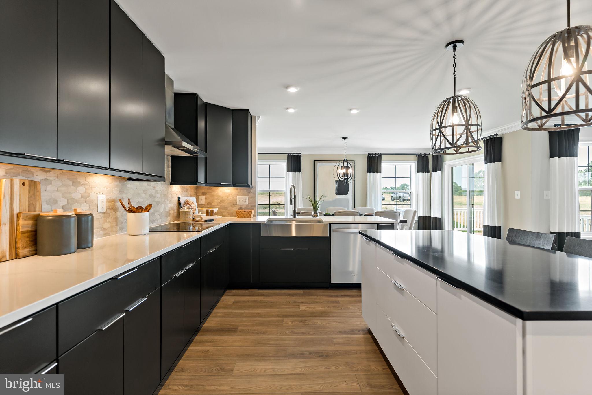Tbb Tbb Outrigger Road, Unit CARNEGIE Inwood, WV 25428 - Photo 10 of 60 a large kitchen with granite countertop lots of counter top space