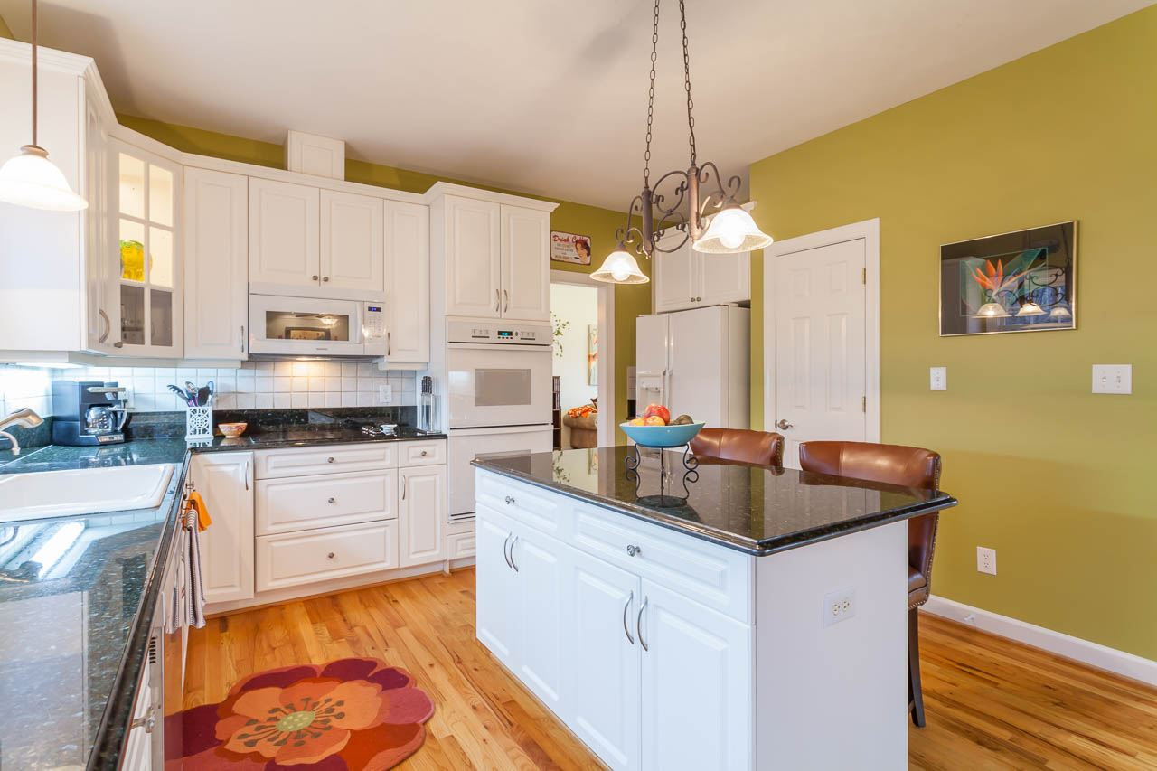 5404 Killarney Hope Drive Raleigh, NC 27613 - Photo 8 of 22 An alternate view with beautiful accents. Kitchen