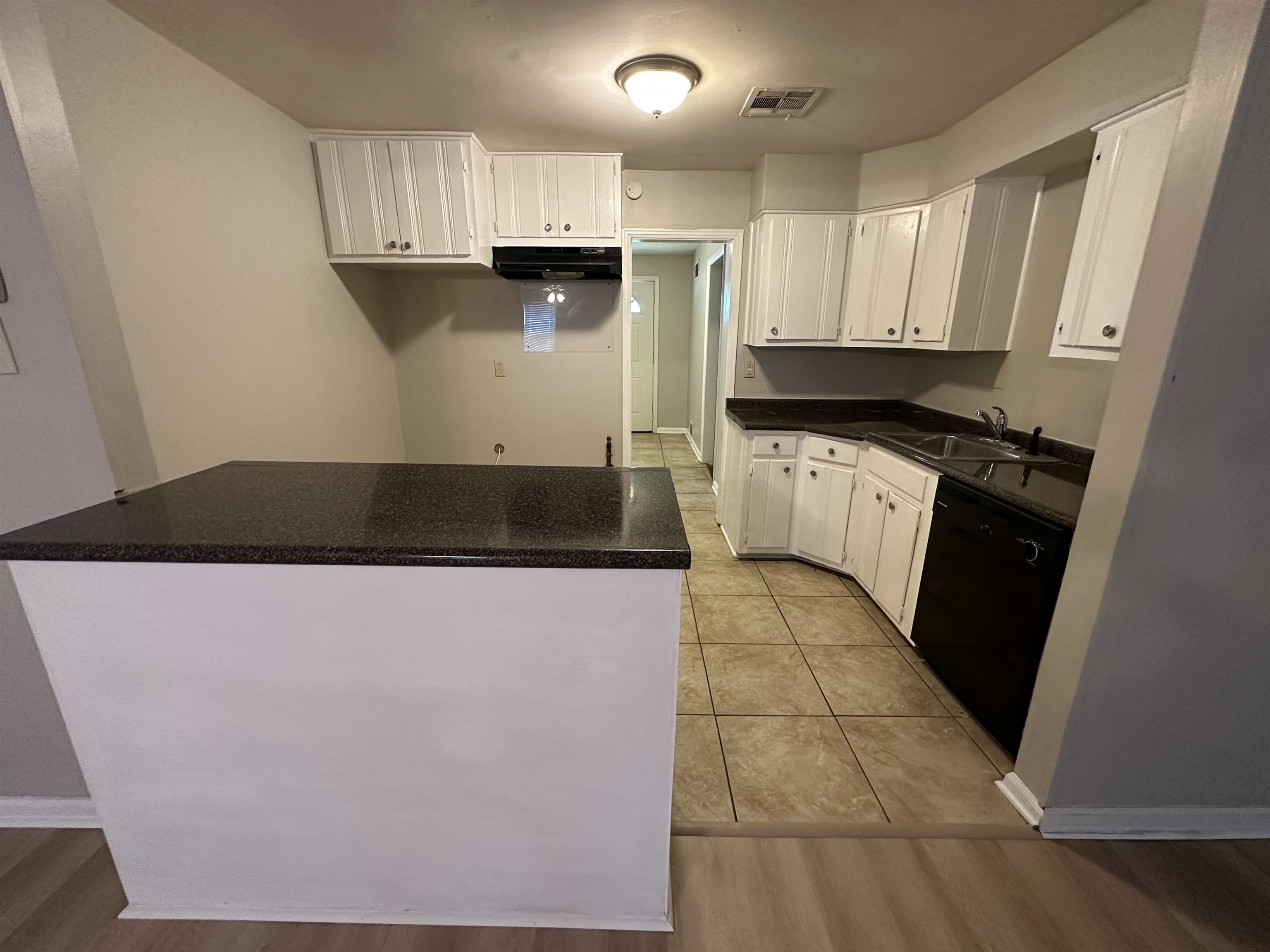 1203 Wilbec Road Memphis, TN 38117 - Photo 5 of 18 a kitchen with stainless steel appliances granite countertop a refrigerator a sink and a stove