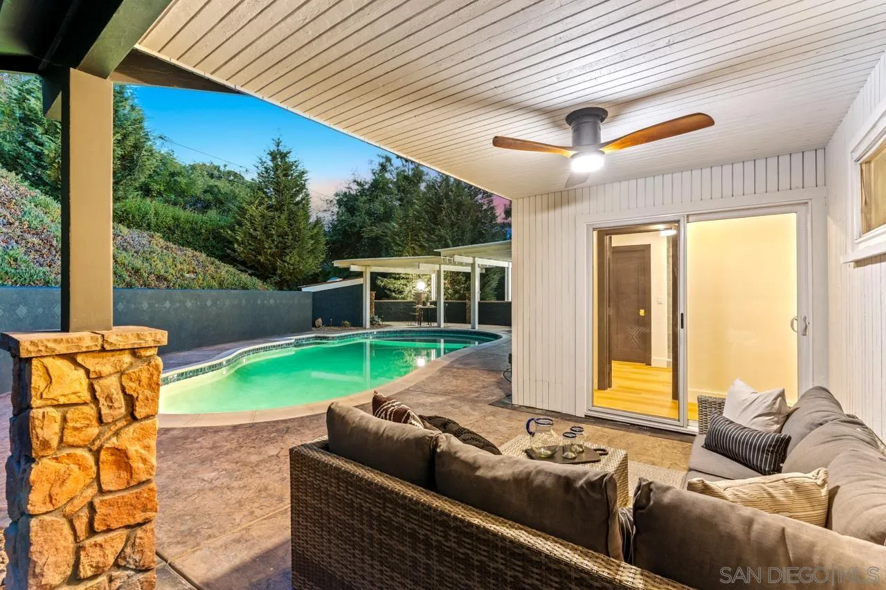 4911 Beaumont Drive La Mesa, CA 91941 - Photo 15 of 74 a backyard of a house with seating space