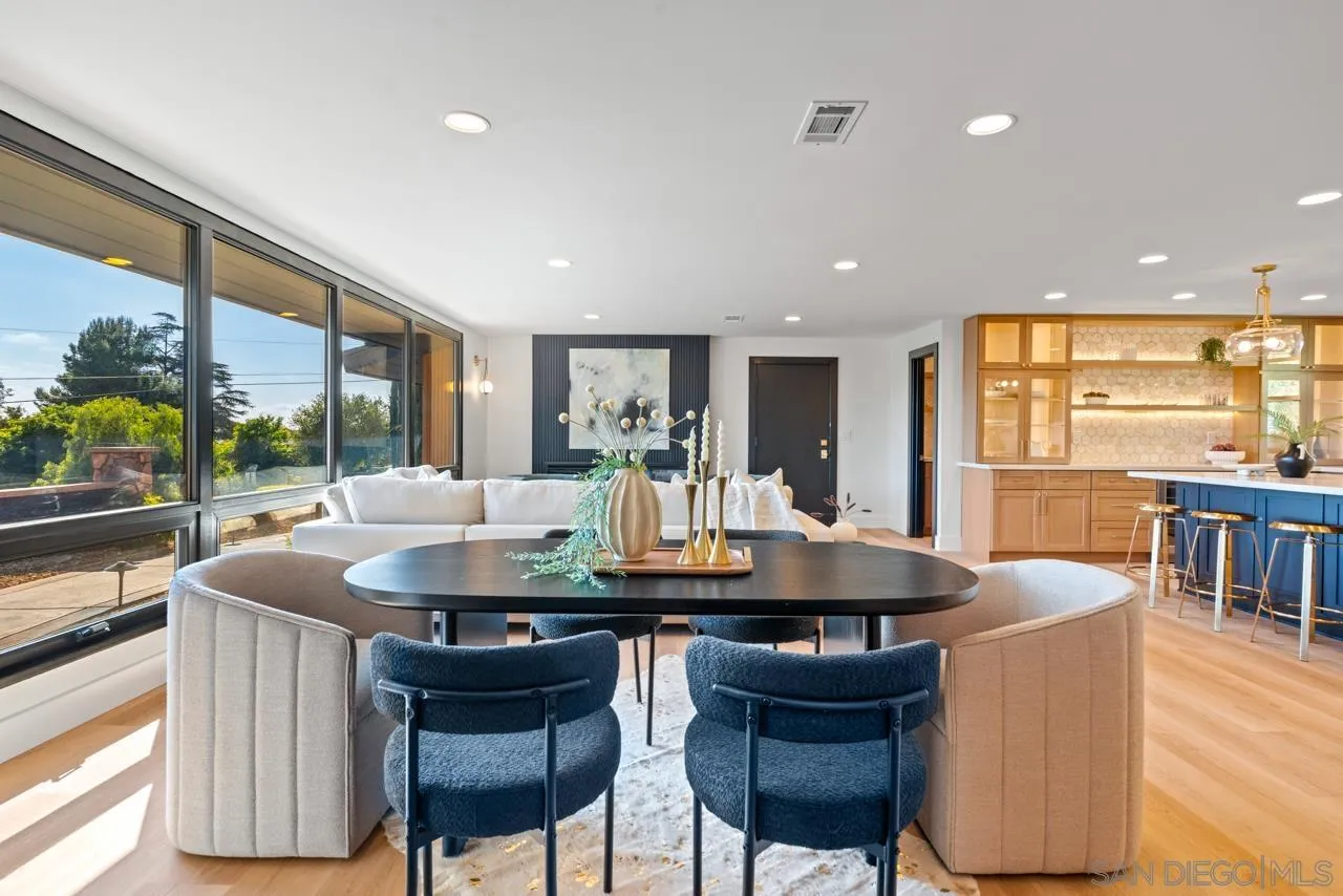 4911 Beaumont Drive La Mesa, CA 91941 - Photo 30 of 74 a dining room with furniture window and wooden floor