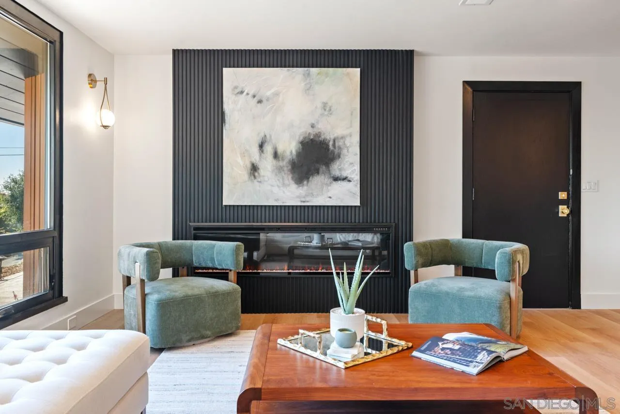 4911 Beaumont Drive La Mesa, CA 91941 - Photo 31 of 74 a living room with furniture and wooden floor