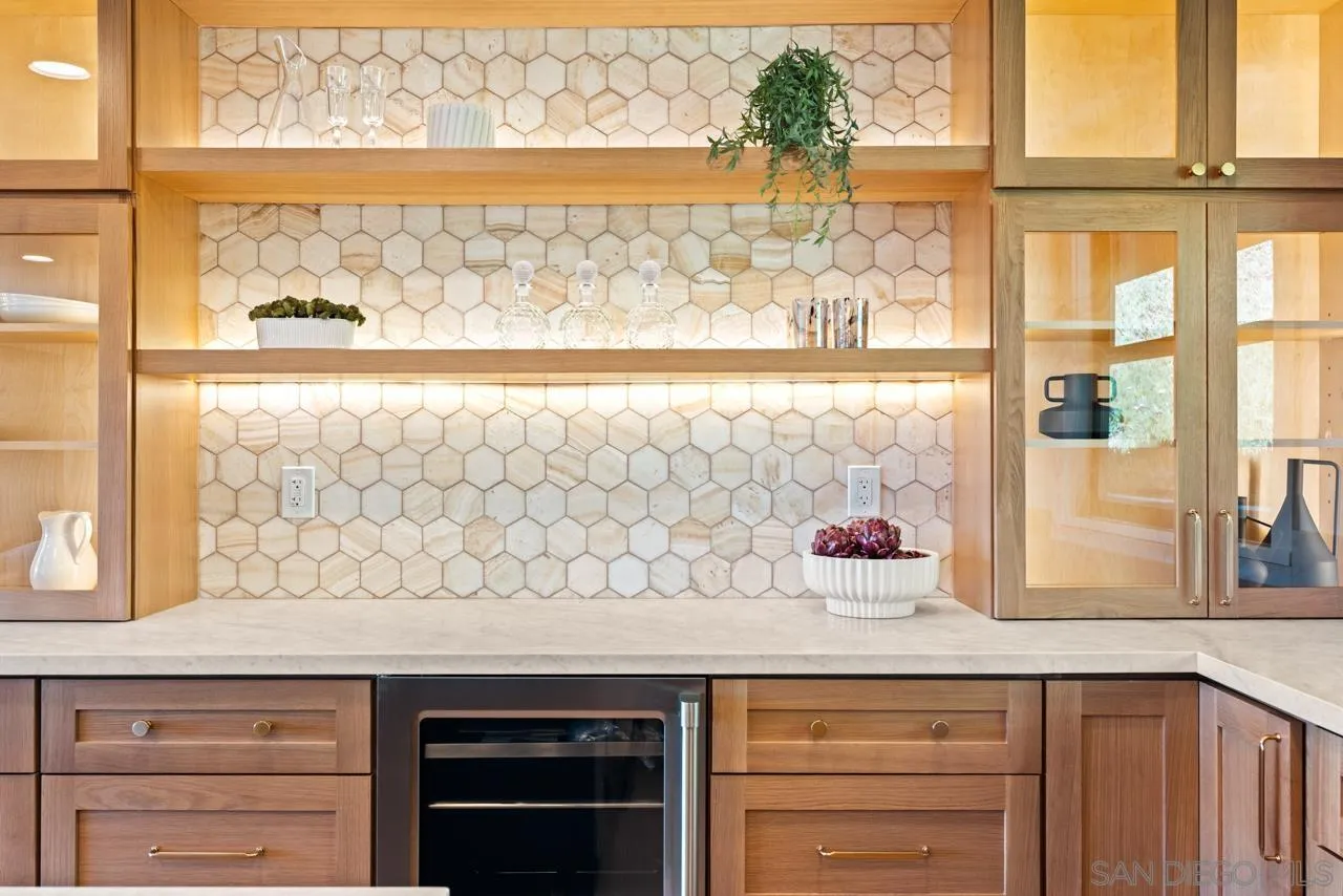 4911 Beaumont Drive La Mesa, CA 91941 - Photo 41 of 74 a kitchen with a sink and large window