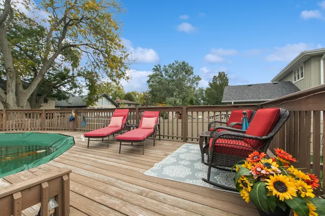 a sitting area with furniture and garden
