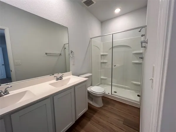 a view of a swimming pool and an outdoor seating