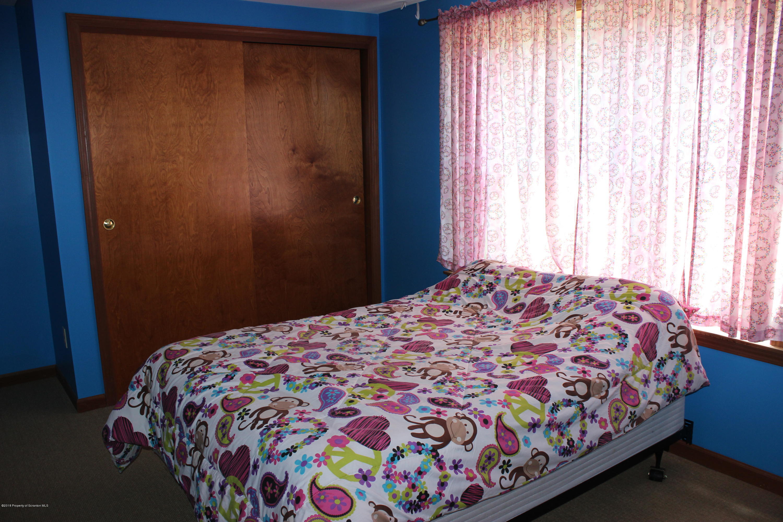 904 Broadway Road Shickshinny, PA 18655 - Photo 54 of 71 a bedroom with a bed and a window