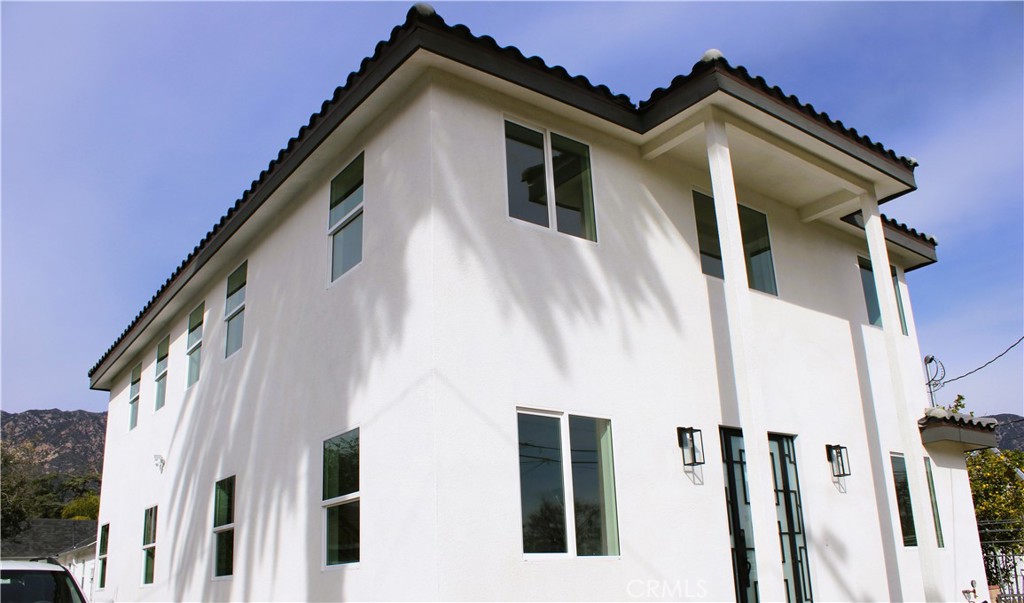 a view of a house with a white door