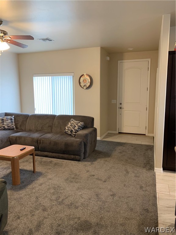 3574 North Kenneth Road Kingman, AZ 86409 - Photo 5 of 20 a living room with furniture and a window