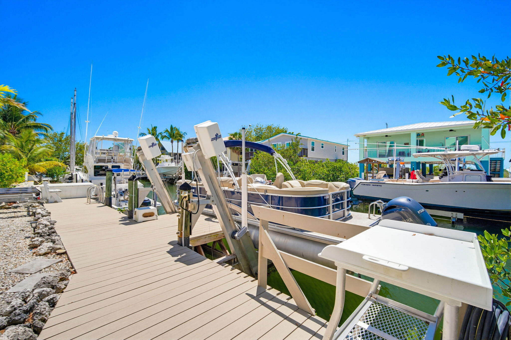 612 Blackbeard Road Summerland Key, FL 33042 - Photo 57 of 68 a view of a chairs and tables in patio