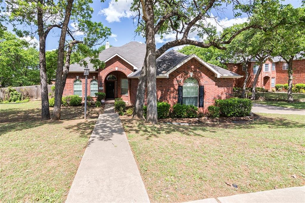 1404 Hummingbird Court Crowley, TX 76036 - Photo 1 of 1 a front view of a house with a yard