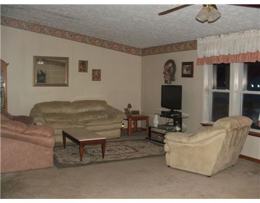 1002 Clinton Frankfort Road Clinton, PA 15026 - Photo 3 of 15 Living Room. Living room features cathedrial ceiling, ceiling fan and plenty of windows for natural light.